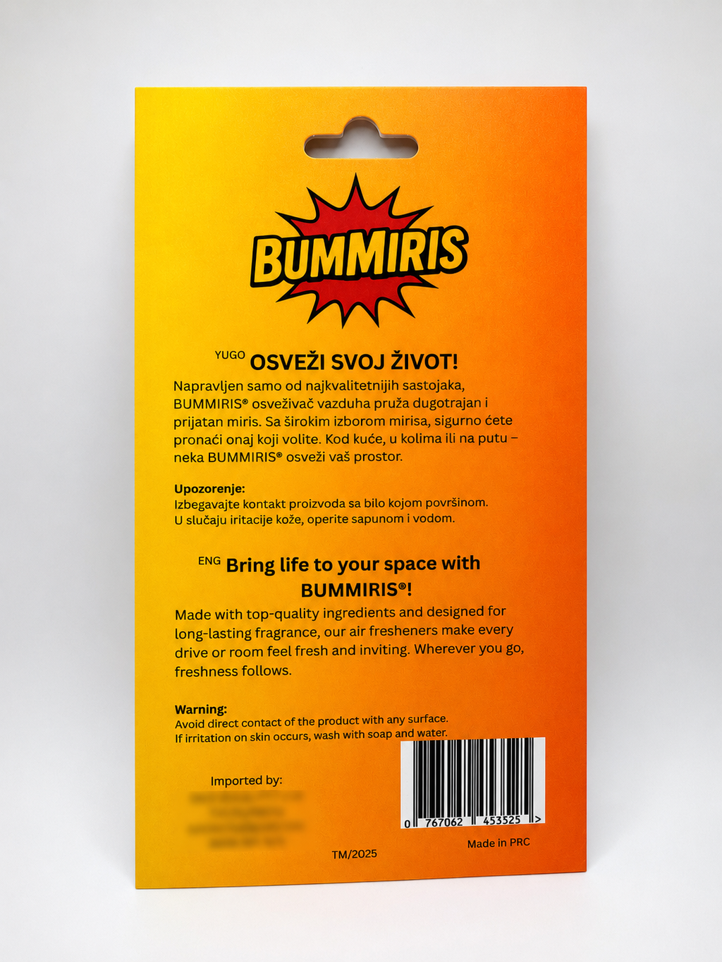 The back of a Bummris fragrance packaging card, featuring product details in English and Yugoslavian, a barcode, and a bright yellow-to-orange gradient background.