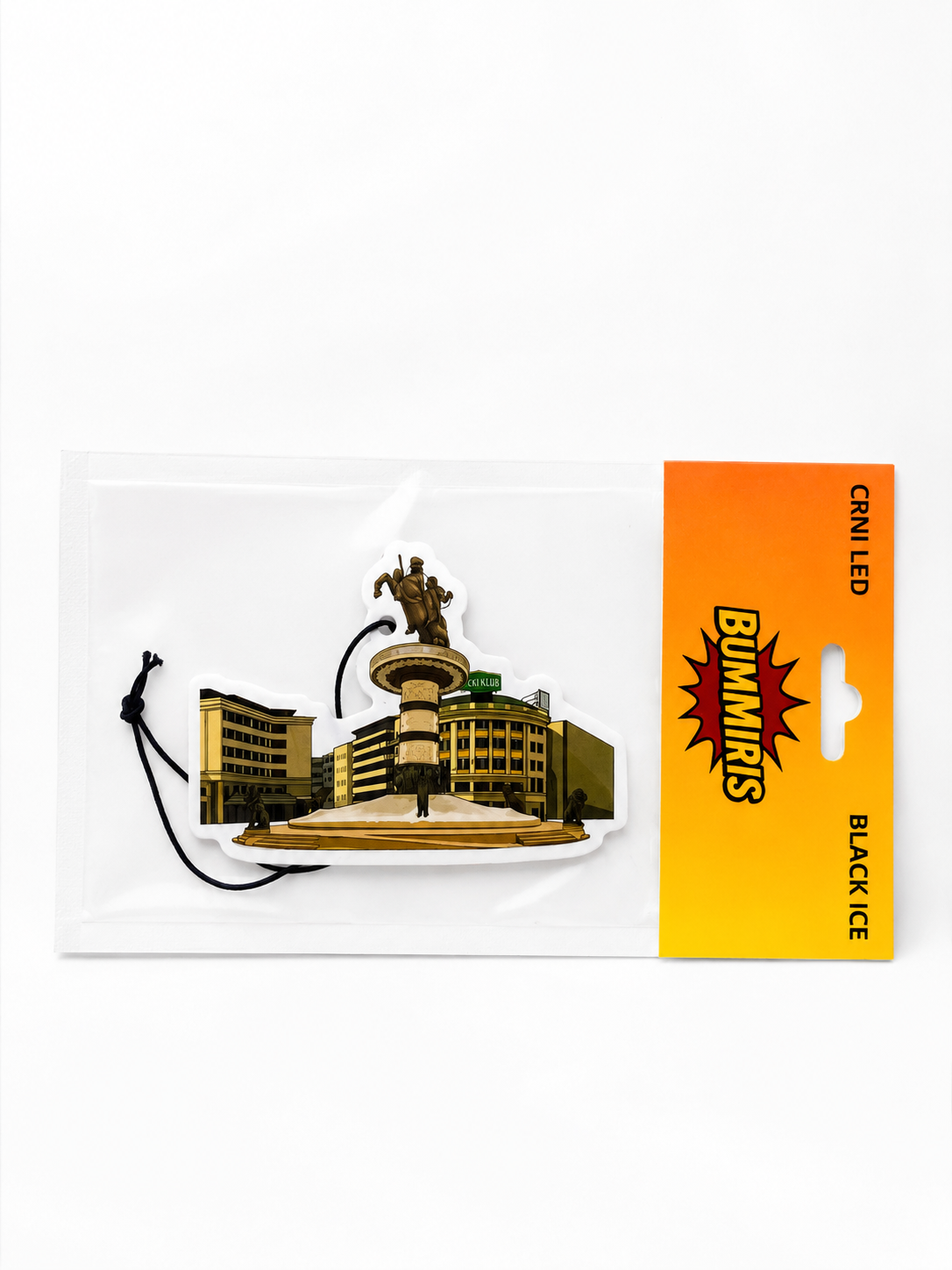 Packaged car air freshener featuring a 3D-printed cityscape monument with a black cord, on a white background with a yellow and orange Bumpits brand card.